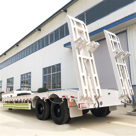 Fengyuan Heavy Machine Carrier Tri Axle Lowbed Semi Trailer 60 Tons