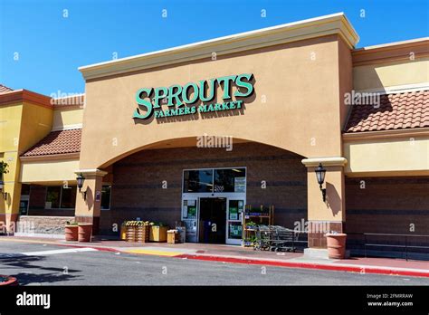 Sprouts Farmers Market Sign Above The Retail Grocery Store Entrance