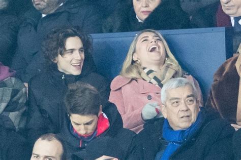 FLORENCE PUGH and Timothee Chalamet at PSG Match at Parc Des Princes in ...