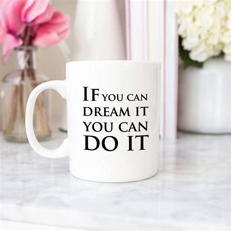 a white coffee mug with the words if you can dream it, you can do it