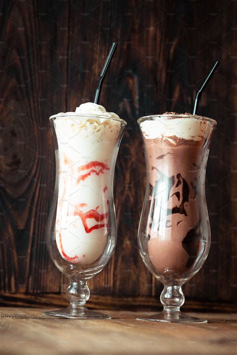 Two Glasses Of Milkshake Featuring Background Berry And Beverage