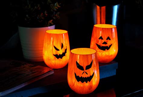 How to Make Dollar Store Jack-O-Lantern Candle Holders — Recharge Workshop