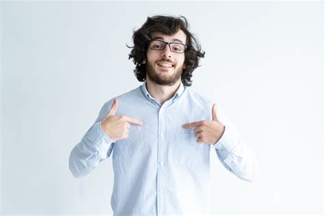 Free Photo Confident Black Haired Young Man Pointing At Himself