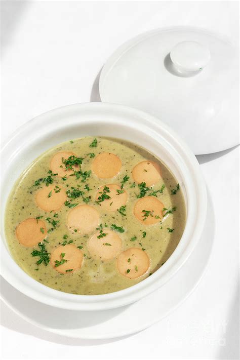 German Traditional Kartoffelsuppe Potato And Sausage Soup On Whi