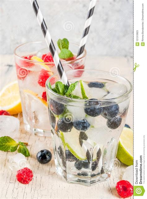 Various Berry Lemonade Or Mojito Cocktails Fresh Iced Lemon Lime Raspberry Blueberry Infused