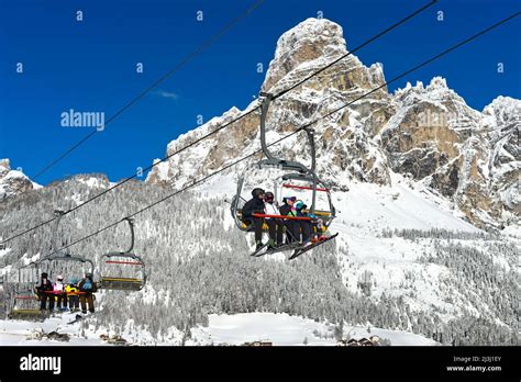 Skiers On The Chairlift In The Ski Resort La Villa Hi Res Stock