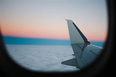 Hd Wallpaper White Airplane Wing Above White Clouds White Airplane