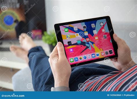 Man Hand Holding Ipad Pro With Home Page Ios Editorial Image Image Of