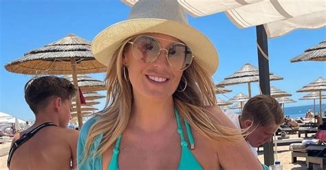 Kate Ferdinand Stuns In Plunging Blue Bikini As She Shares Throwback