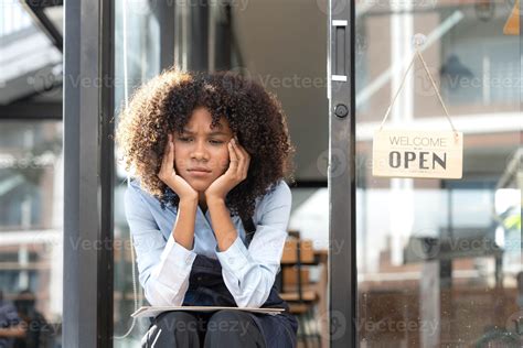 Black Woman Waiter Of Street Cafe Is Waiting For Clients Customersm She Is Bored No People In