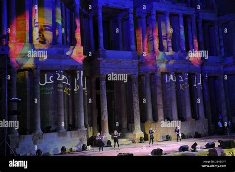 British String Quartet Bond Performs Under Portraits Of Libyan Leader