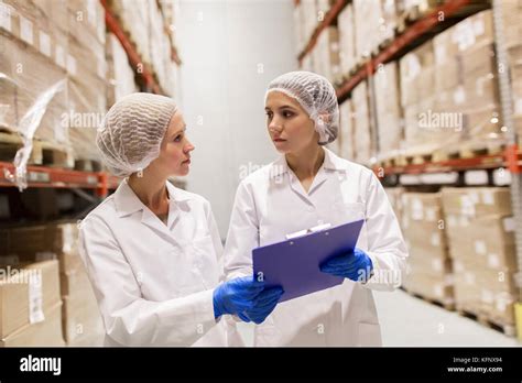 Women Technologists At Ice Cream Factory Warehouse Stock Photo Alamy