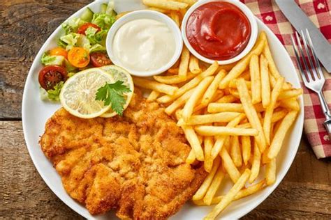 Pommes Schnitzel Gipfel in Berlin Julia Klöckner schmeckt der