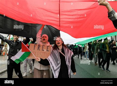 Participants Of The March Of Solidarity With Palestine Carry A Large