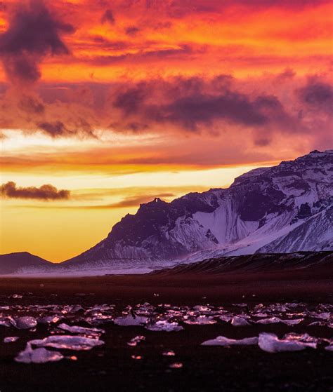 An epic sunset over Diamond Beach, Iceland [1820x2150] [OC] : EarthPorn