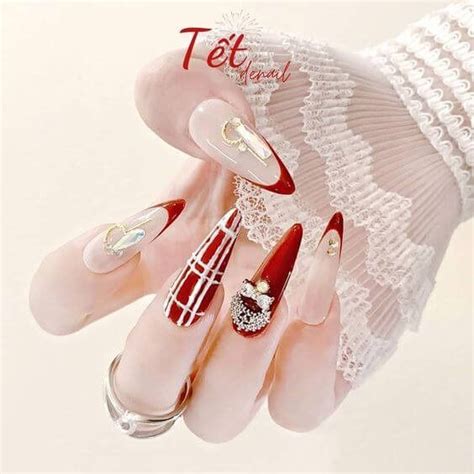 Gorgeous Red And Gold Nails For A Sophisticated Manicure Red And