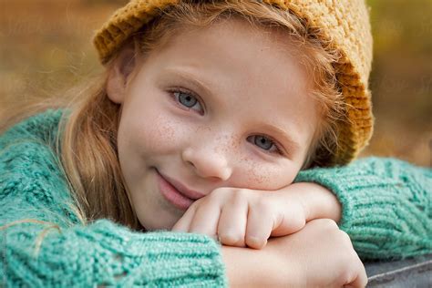 Portrait Of A Red Haired Girl With A Freckles By Stocksy Contributor