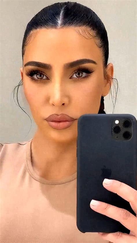 Kim Kardashian Fierce Eyebrows And Nude Brown 90s Lipstick Makeup Look