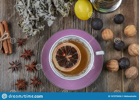 Herbal Sage Tea With Dried Sage Leaves On Wooden Rustic Background