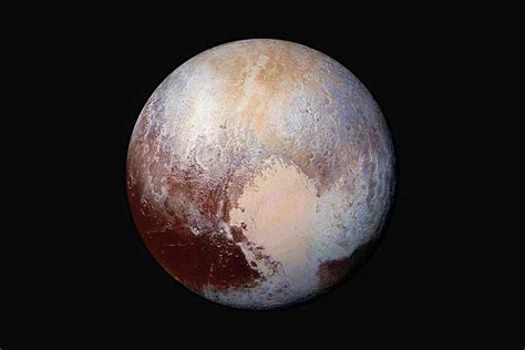 Pluto Is Covered In Huge Red Patches And We Dont Know What They Are