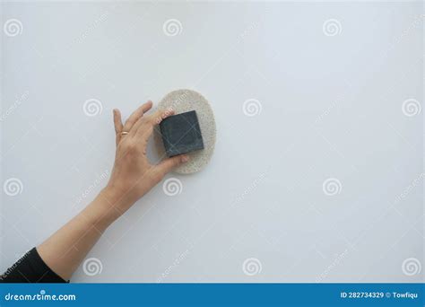 Top View Of Women Hand Pick Natural Soap Bar On White Background Stock