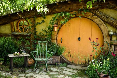 Hobbiton Movie Set Step Into The Shire Pin Your Footsteps Travel Blog