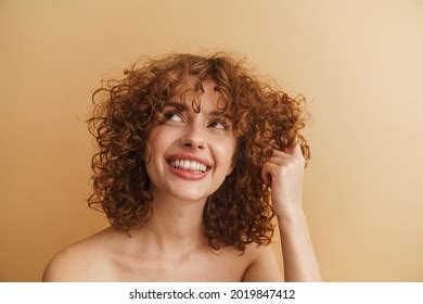 Halfnaked Ginger Woman Laughing While Posing Stock Photo