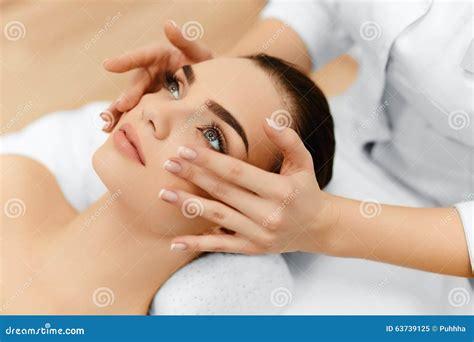 Skin Body Care Woman Getting Beauty Spa Face Massage Treatmen Stock