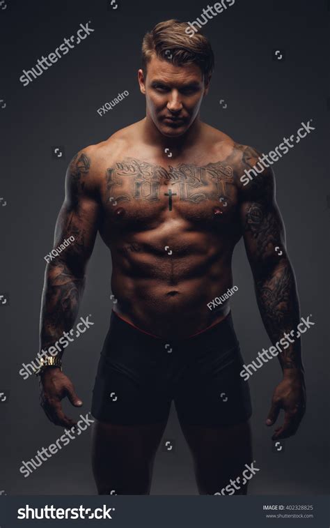 Naked Muscular Tattooed Man Isolated On Stock Photo 402328825 Shutterstock