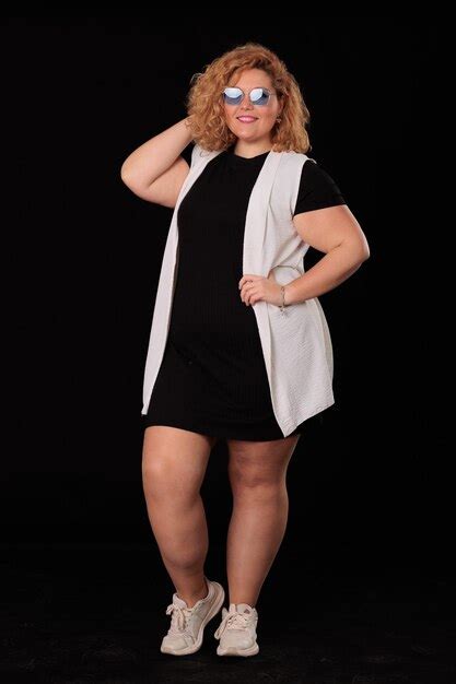Premium Photo Plus Size Blonde Woman In Photo Studio On Black
