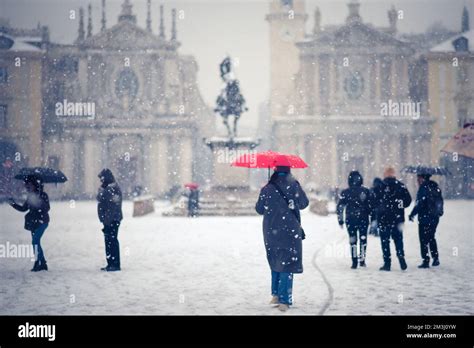 Turin Torino People In Piazza San Carlo Under The Snow Stock Photo
