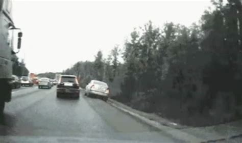 Video Captures Reckless Driver Overtaking Slow Moving Traffic On