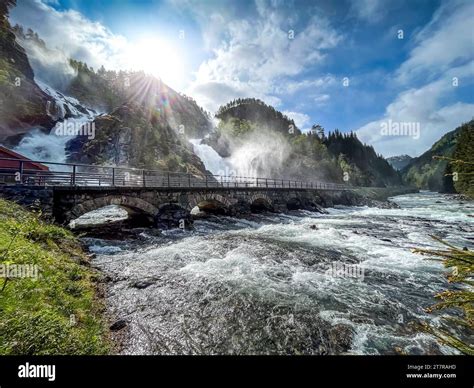 The Old Stone Bridge And Latefossen Waterfall Stock Photo Alamy