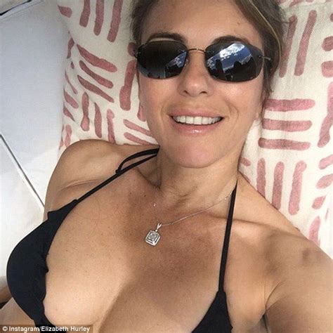 Elizabeth Hurley 51 Shows Off Jaw Dropping Figure In Striped Bikini Elizabeth Hurley