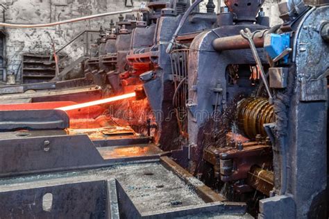 The Process Of Rolling Hot Rolled Steel In A Rolling Mill Stock Photo