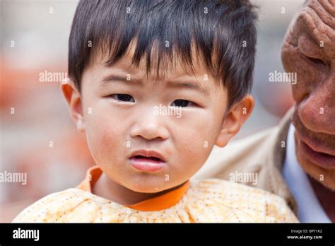 Little Boy And His Grandfather In Dali China Stock Photo Alamy