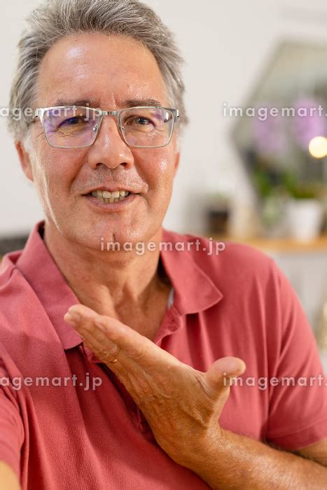 Closeup Portrait Of Caucasian Smiling Senior Man Wearing Glasses