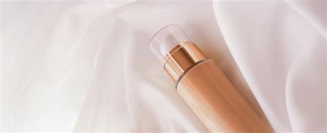 Premium Photo Tonal Bb Cream Bottle Makeup Fluid Foundation Base For Nude Skin Color On Silk