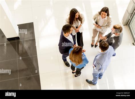 Overhead View Of People Having Business Meeting Stock Photo Alamy