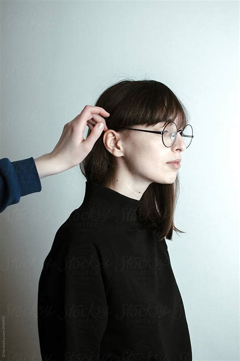 Portrait Of Woman In Glasses With Long Hair By Stocksy Contributor