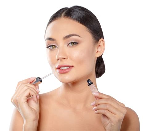 Premium Photo Beauty Portrait Of A Playful Beautiful Half Naked Woman Applying Make Up With A