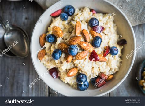 Oatmeal With Berries And Nuts Stock Photo Shutterstock