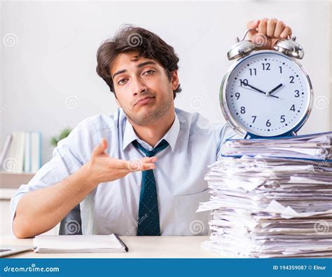 Overloaded Busy Businessman Having Lunch At Work Stock Image