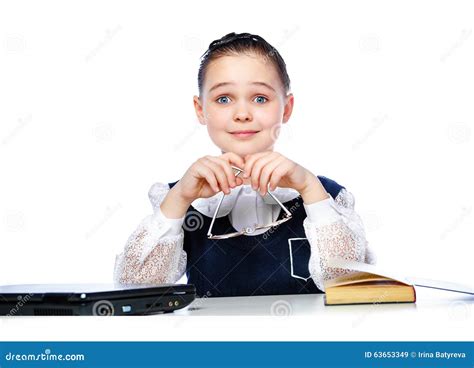 Portrait Of A Girl Sitting At A School Desk School Classroom Stock