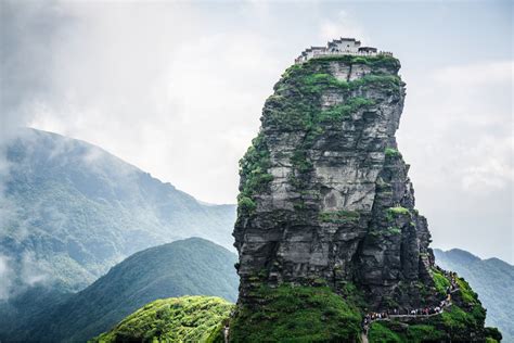 Two Buddhist temples are perched on a peak more than 2,300 meters above ...