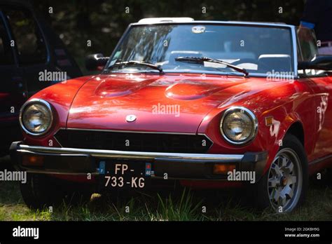 Red Fiat 124 Spider At Dégagnazès Country Fair Lot Department France