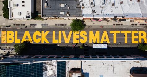 Street mural of Black Lives Matter, painted on blocks in Brooklyn