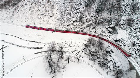 Red train of Bernina, Bernina Express. Aerial view Stock Photo | Adobe Stock