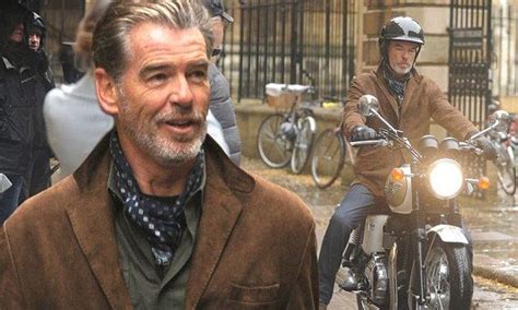 Pierce Brosnan Struggles To Ride Classic Motorbike On Set Of New Film