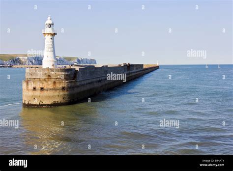 Dover Lighthouse with White Cliffs in Background Stock Photo - Alamy